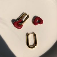 2021 New Metal Texture Red Bean Color Light Luxury French Retro Red Heart Ear Buckle Wholesale main image 4