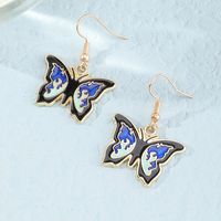 New Korean Simple Fashion Butterfly Ear Hoop Earrings Female Retro Alloy Drip Ear Jewelry main image 3
