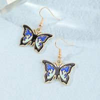 New Korean Simple Fashion Butterfly Ear Hoop Earrings Female Retro Alloy Drip Ear Jewelry main image 5
