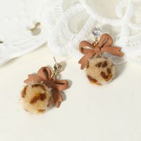 Korean Version Of The Fashion Autumn And Winter New Bow Leopard Hair Ball Earrings Simple Retro Niche Creative Earrings main image 3