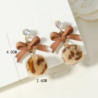Korean Version Of The Fashion Autumn And Winter New Bow Leopard Hair Ball Earrings Simple Retro Niche Creative Earrings main image 5