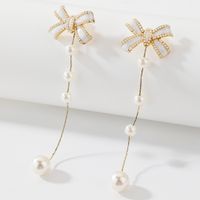 925 Silver Needle Drop Oil Bow Pearl Tassel Earrings Two-wear High-quality Earrings main image 1