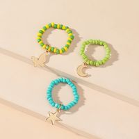 Simple Hand-woven Rice Bead Ring Fashion Temperament Butterfly Moon Star Pendant Elastic 3-piece Set main image 4