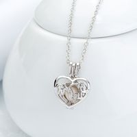 European And American Popular Personalized Mother And Child Concentric Necklace Pearl Heart Cage Diy Pendant Ornament main image 5