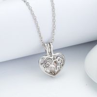 European And American Popular Personalized Mother And Child Concentric Necklace Pearl Heart Cage Diy Pendant Ornament sku image 1