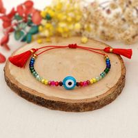 Simple Bohemian Ethnic Style Colored Glaze Blue Eye Beads Rainbow Crystal Beaded Tassel Couple Small Bracelet main image 2