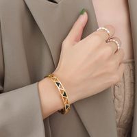 18k Gold-plated Titanium Steel Hand Jewelry Wholesale Triangle Acrylic Hollow Bracelet main image 3
