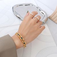 18k Gold-plated Titanium Steel Hand Jewelry Wholesale Triangle Acrylic Hollow Bracelet sku image 1