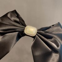 Black Texture Korean Drape Smooth Solid Color Big Bow Spring Clip Hairpin main image 1