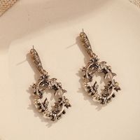 Koreanische Mode Europäische Und Amerikanische Große Marke Legierung Diamant Blumen Förmige Hohle Ohrringe Frauen Retro Bohemian Schmuck main image 4