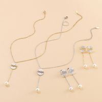 New Fashion Round Shell Letter Love Tassel Pearl Necklace Earrings Female Jewelry Set main image 3