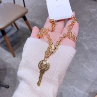 High-grade Ins Cold Style Key Pendant Necklace Female Copper Plating K Gold Simple Fashion Sweater Chain Cross-border Sold Jewelry main image 1