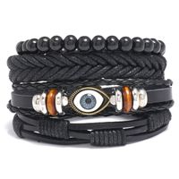 Pulsera De Ojo Trenzado De Cuero Negro Con Combinación De Cuatro Piezas Retro Diy sku image 1