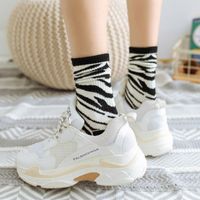 Autumn And Winter New Japanese Black And White Series Zebra Pattern Ladies Mid-tube Socks Wholesale main image 5