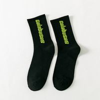 Automne Et Hiver Nouvelle Japonais Rue Sport Loisirs De Femmes Mi-mollet Chaussettes En Gros Anglais Lettres Hip Hop Planche À Roulettes Chaussettes À La Mode sku image 4