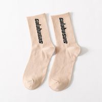 Automne Et Hiver Nouvelle Japonais Rue Sport Loisirs De Femmes Mi-mollet Chaussettes En Gros Anglais Lettres Hip Hop Planche À Roulettes Chaussettes À La Mode sku image 1