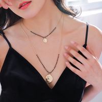 European And American Creative Fashion Hand-woven Bead Chain Golden Retro Coin Pendant Necklace main image 3