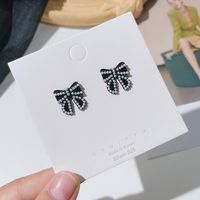 Korean Fashion Temperament Pearl Black Bow Earrings Autumn And Winter New Wild Earrings main image 1