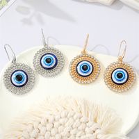 Bijoux Transfrontaliers Européens Rétro Boucles D&#39;oreilles En Strass Creux Ronds Oeil De Démon Bleu main image 1