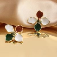 Korean Version Dripping Oil Four-leaf Flower Fashion Earrings Golden Rim And Flower Temperament Earrings sku image 1