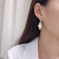 E572 Korean Style S925 Silver Pearl Earrings Women's Irregular Concave And Convex Pleated Leaf-shaped Earring Fashionable Earrings main image 5