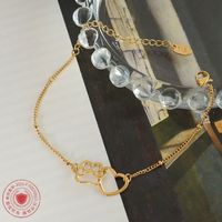 Corée Coeur Empreintes De Pas En Acier Titane Plaqué 18k Bracelet En Gros main image 4