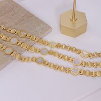 Fashion Titanium Steel Plated 18k Gold T-shaped Small Flower Round White Sea Shell Bracelet main image 1