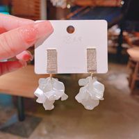 Fashion Copper Micro-inlaid Zircon White Resin Petal Earrings main image 3