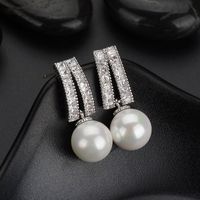 Boucles D&#39;oreilles Zircon Incrustées De Perles Géométriques De Mode En Gros main image 3