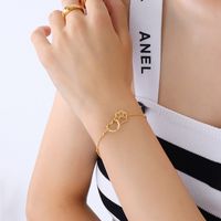 Corée Coeur Empreintes De Pas En Acier Titane Plaqué 18k Bracelet En Gros sku image 2