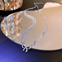 Korean Design Sense Asymmetric Bow Titanium Steel Necklace Female Fashion Clavicle Chain sku image 1