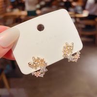 Korean New C-shaped Small Flower Butterfly Copper Zircon Earrings Wholesale sku image 1