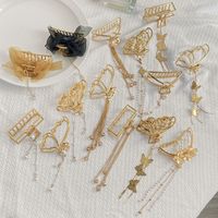Creative Three-dimensional Butterfly Pearl Pendant Tassel Grasping Clip Hairpin main image 1
