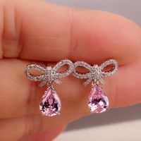 1 Pair Elegant Bow Knot Inlay Copper Alloy Artificial Pearls Zircon Drop Earrings main image 1