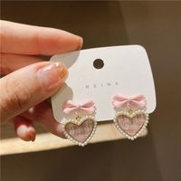 South Korea's New Trendy Design Pearl Lattice Heart Bow Stud Earrings main image 2