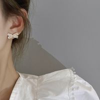 Korean Personality Pearl Earrings Bow Diamond Niche Earrings main image 4