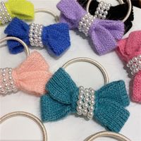 Autumn And Winter New Bow Wool Simple Headband Female Online Influencer Ins Rubber Band Female Hair Tie Pearl Tie Waist Hair Ring main image 4
