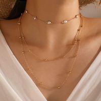 Arbeiten Sie Mehrschichtige Perlenschlüsselbeinkette Weibliche Einfache Lange Legierungshalskette Um main image 1