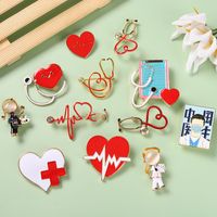 Tendance Stéthoscope Série Médicale Broche Stéthoscope Créatif Électrocardiogramme Docteur Forme Insigne De Peinture main image 2