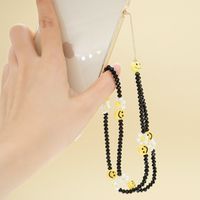 Black Crystal Beads Personality Small Daisy Yellow Smiley Face Mobile Phone Chain main image 1