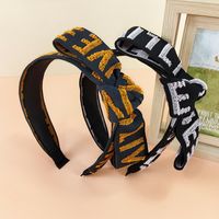Retro Letters Hairy Knotted Wide-sided Ribbon Mixed Color Bowknot Pressed Hairband main image 3