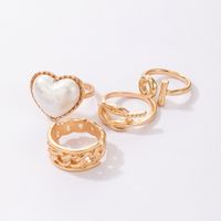 European And American Pearl Heart Ring Four-piece Irregular Geometric Hollow Ring Set main image 6