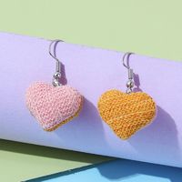 Korean Creative Popular Knitted Wool Peach Heart Earrings Wholesale main image 2