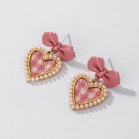 925 Silver Needle Vintage Pearl Fabric Love Heart Bow Tie Earrings European And American Ins Simple Autumn And Winter Check Graceful Earrings main image 5