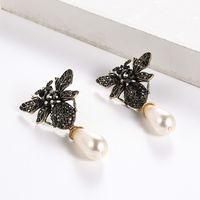 European And American New Alloy Diamond Insect Series Little Bee Ear Studs Exaggerated Pearl Pendant Temperament Female Earrings Hot Sale main image 5