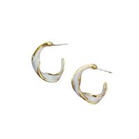 Korean New Retro Earrings Female Simple Personality Twisted Glaze Ring Earrings Wholesale main image 2