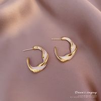 Korean New Retro Earrings Female Simple Personality Twisted Glaze Ring Earrings Wholesale main image 6