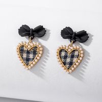 925 Silver Needle Vintage Pearl Fabric Love Heart Bow Tie Earrings European And American Ins Simple Autumn And Winter Check Graceful Earrings sku image 5