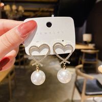 South Korea Temperament Big Pearl Hollow Heart Earrings sku image 1