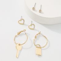 European And American Simple Key Lock Love Asymmetrical Micro-inlaid Temperament Earrings main image 1